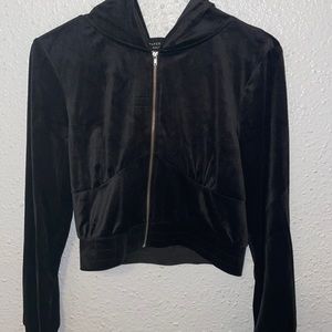 Black velvet sweater.